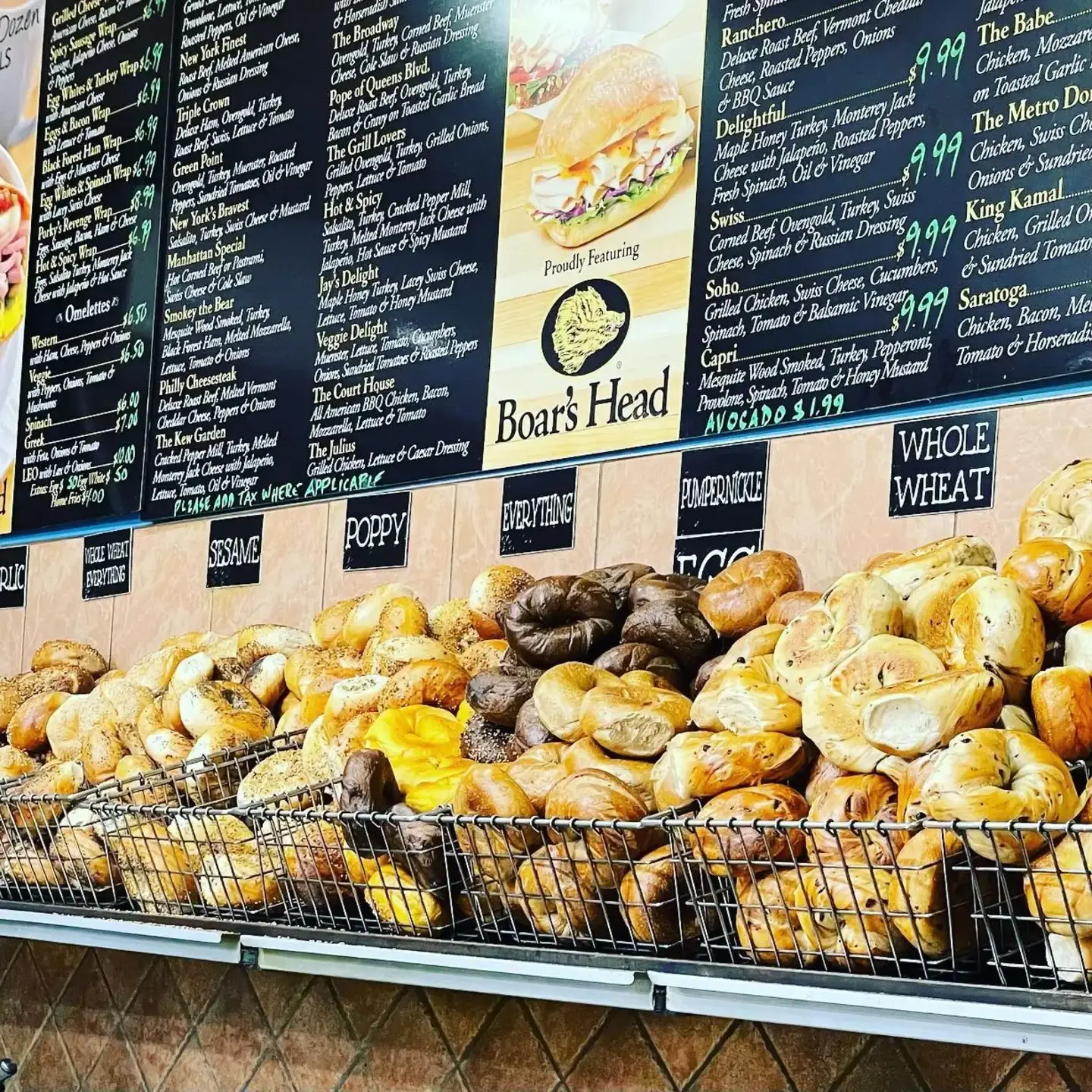 Warm, freshly baked bagels ready for pickup at Baker's Dozen.
